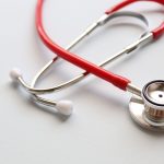 Close-up of a red stethoscope symbolizing medical care and healthcare diagnostics. — "Powerful Performance: Unlock Your Poten