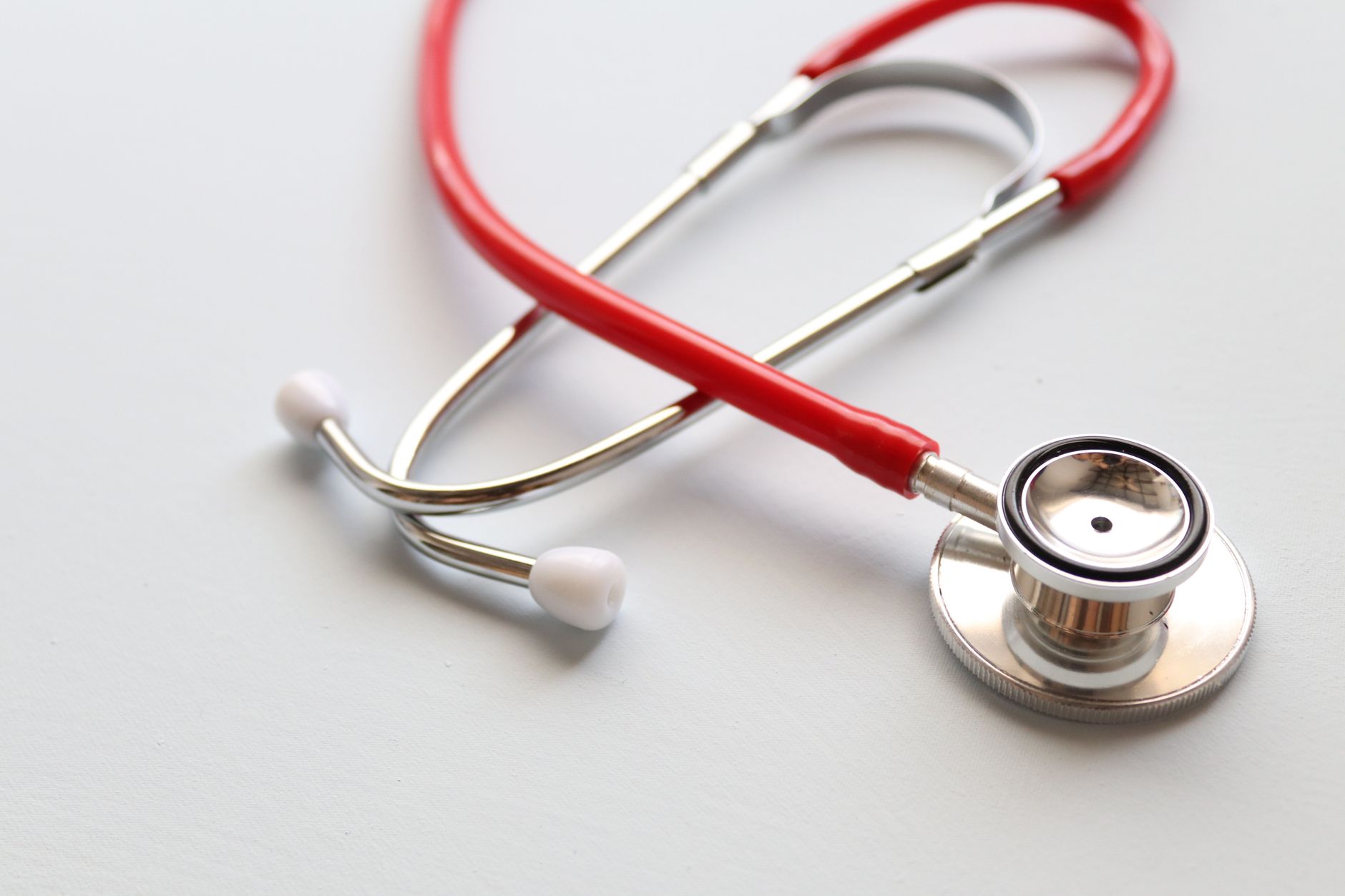 Close-up of a red stethoscope symbolizing medical care and healthcare diagnostics. — "Powerful Performance: Unlock Your Poten